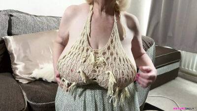 Mature Sally's huge tits in a skimpy top which leaves nothing to the imagination on sexyblondegirl.com