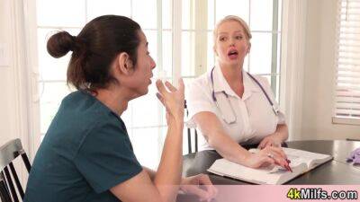 Busty blonde doctress teaches her new doctor about anal examination on sexyblondegirl.com