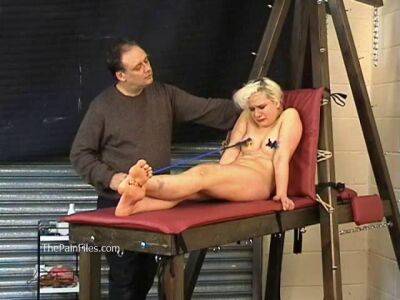 Busty blonde is punished with hot wax and hard spanking on sexyblondegirl.com