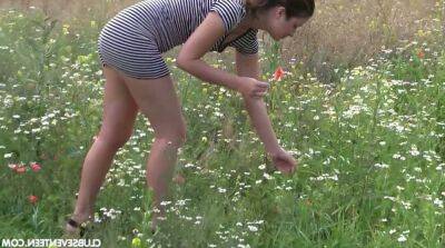 Cute 18 yo babe Lexi Rain is playing with pussy in a meadow on sexyblondegirl.com